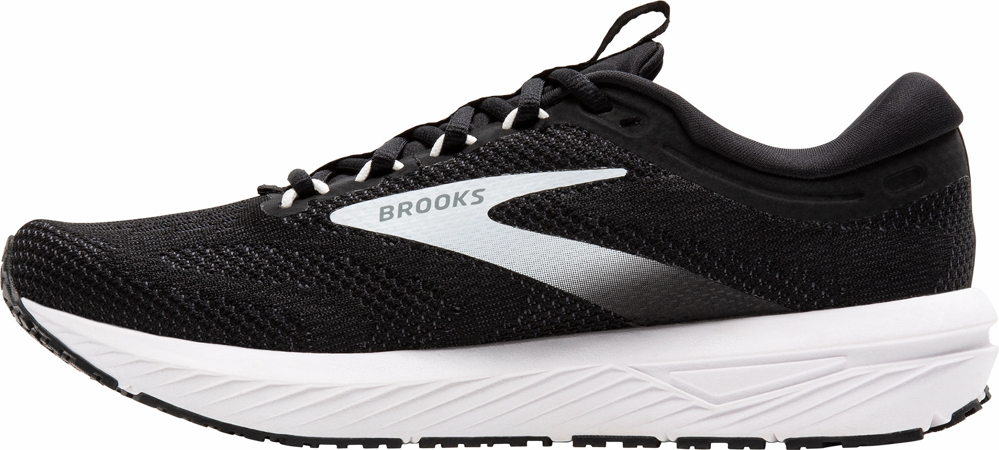 Brooks Revel 7 Mens Running Shoes - Black Sweat Wicking running on a dirt path
