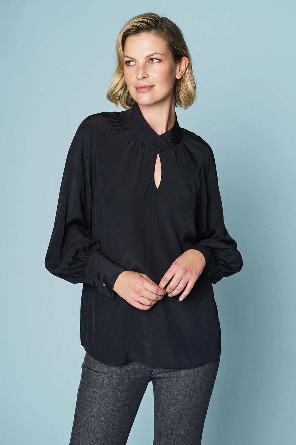 Twist Neck Flounce Top - Black Comfortable Cut Raw Edge Finish