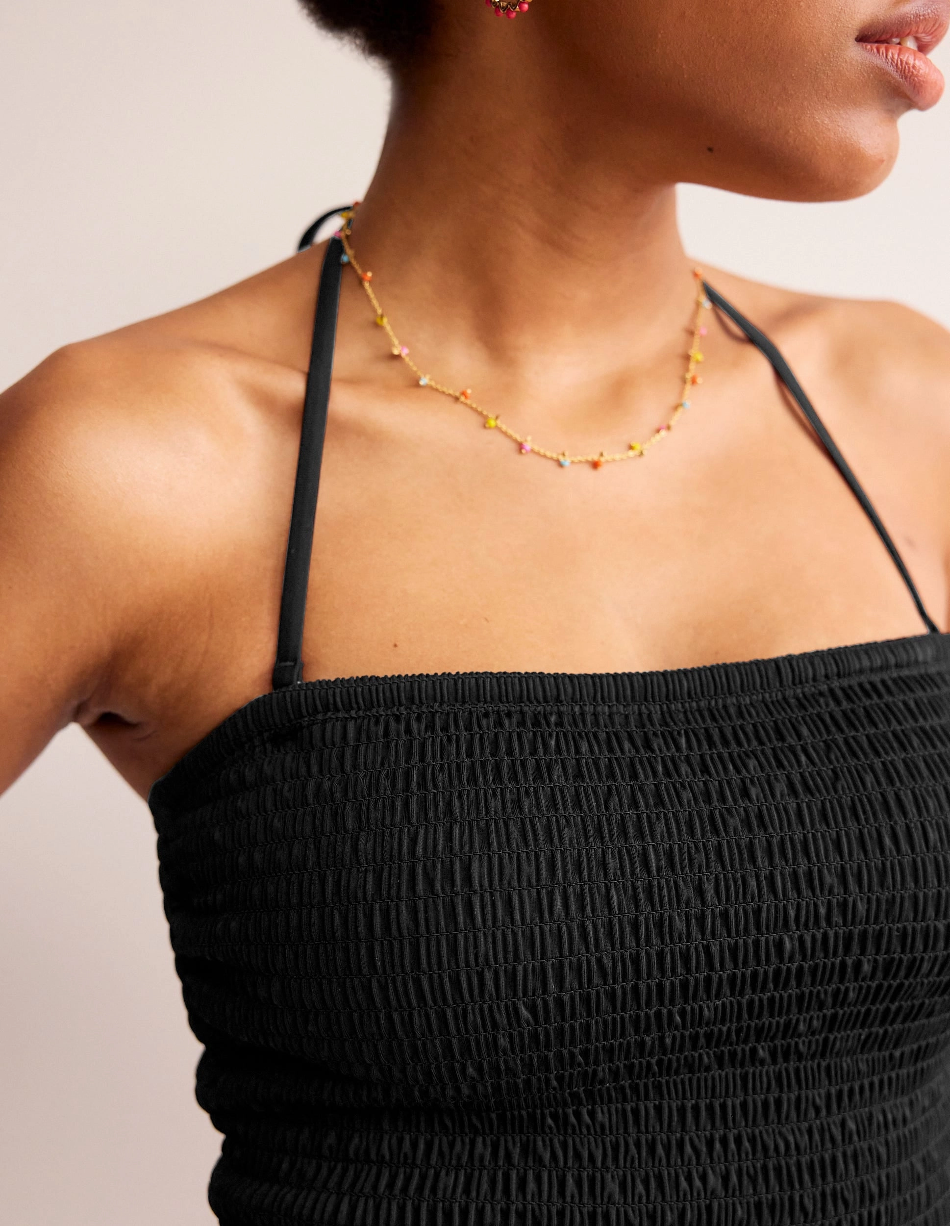 Milos Smocked Bandeau Swimsuit-Black Reinforced Strap Anchors Four Way Stretch