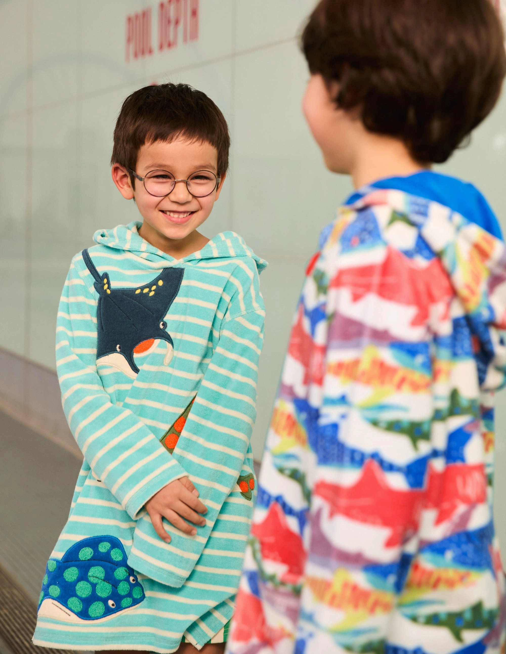 Appliqu?? Towelling Throw-on-Caribbean Blue Stingray Drag Reduction Design Laser Cut Perforations